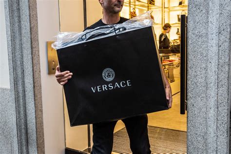 michael kors buys versace for 2.1 billion|michael kors bought versace.